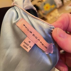 Such a beautiful dress.  It flows and comes right above the knee.